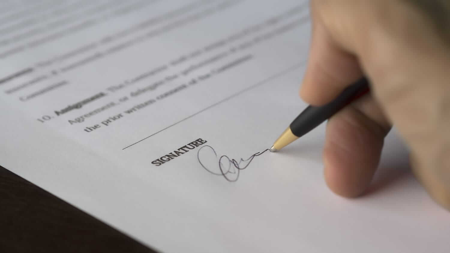 A contract being signed